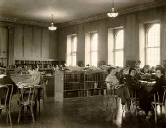 Photograph of the Library Interior, showing students
seated at tables 1935