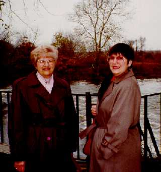 Color photograph of, left, Mrs. Angie Lam, retired library
department secretary, with Mrs. Jeanne Sohn, Director of Library Services, November 1995