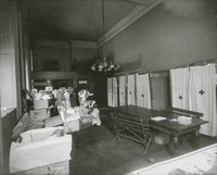Women and Dress: Red Cross workers packing clothing to be shipped to Europe
