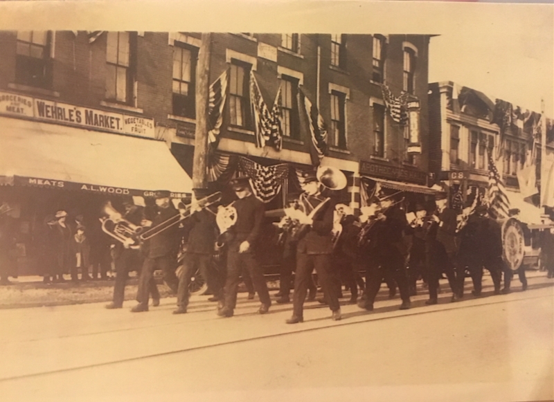 Welcome Home Parade in front of Wehrle's Market.png