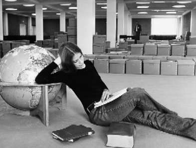 Photograph of student reading in Reference Department