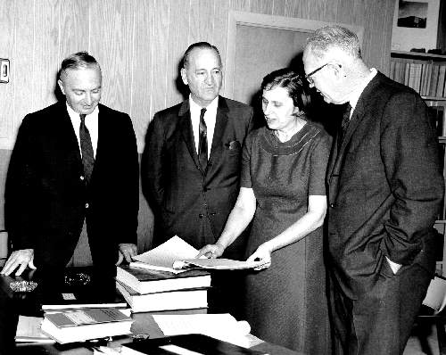 Photograph of, from Left to Right, Dr. Thomas
Grasso, President H.D. Welte, Secretary of State Ella Grasso and Assistant-to-the-President Dr. Harold Bingham
