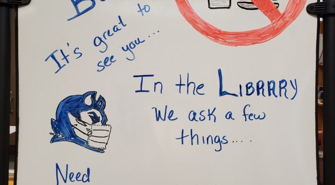 Library whiteboard - welcome back & wear your mask!
